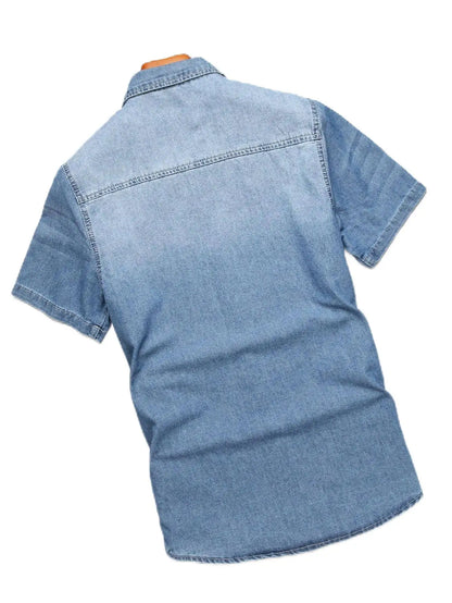 Men's summer blue short - sleeved denim shirt with ripped details. The ripped design elements showcase a trendy and casual style